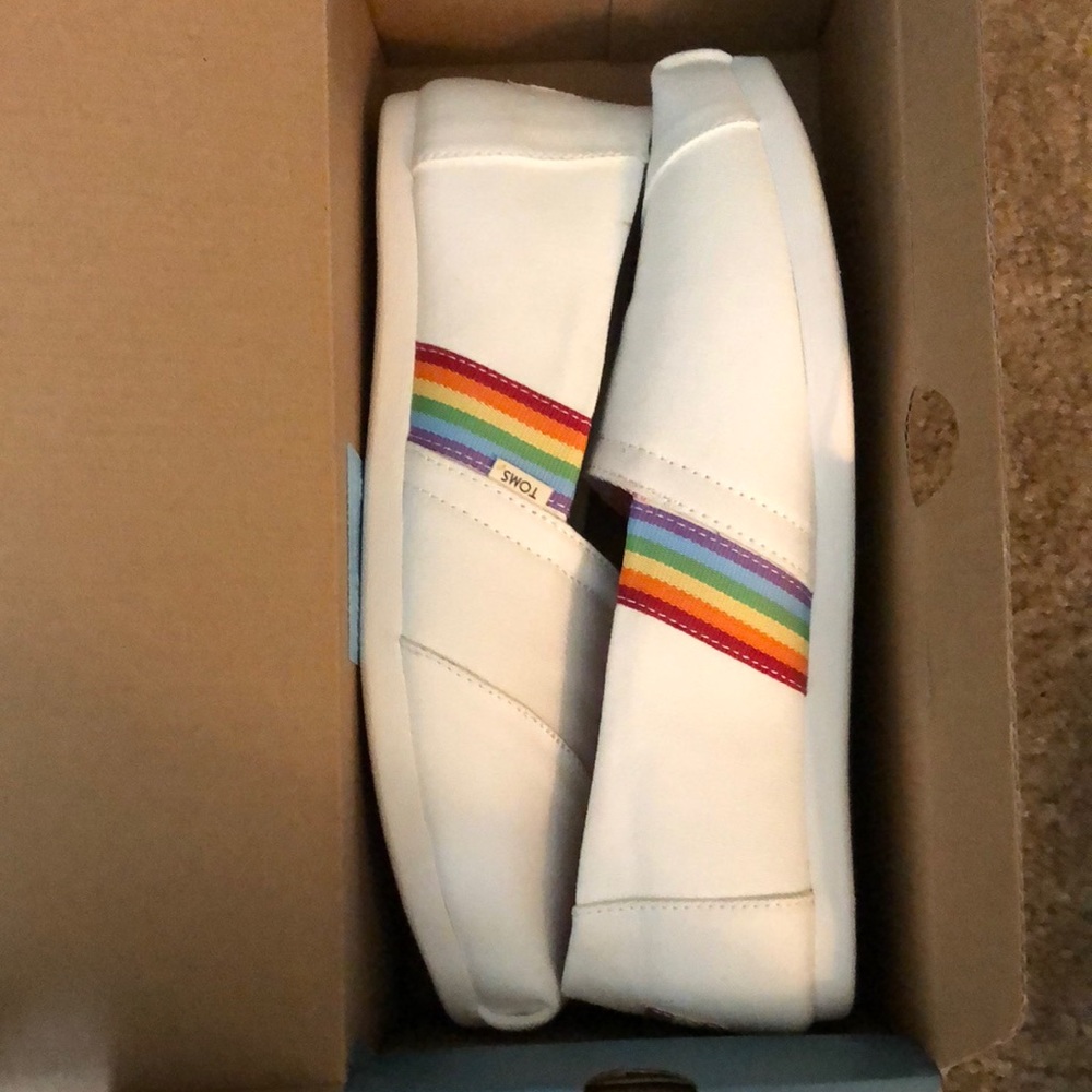 TOMS Classic White Rainbow Stripe shoes. Size 7 WMN. Brand new and never worn.